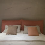 Soft Pink Upholstered Bed with Oversized Cushion Headboard & Rounded Base